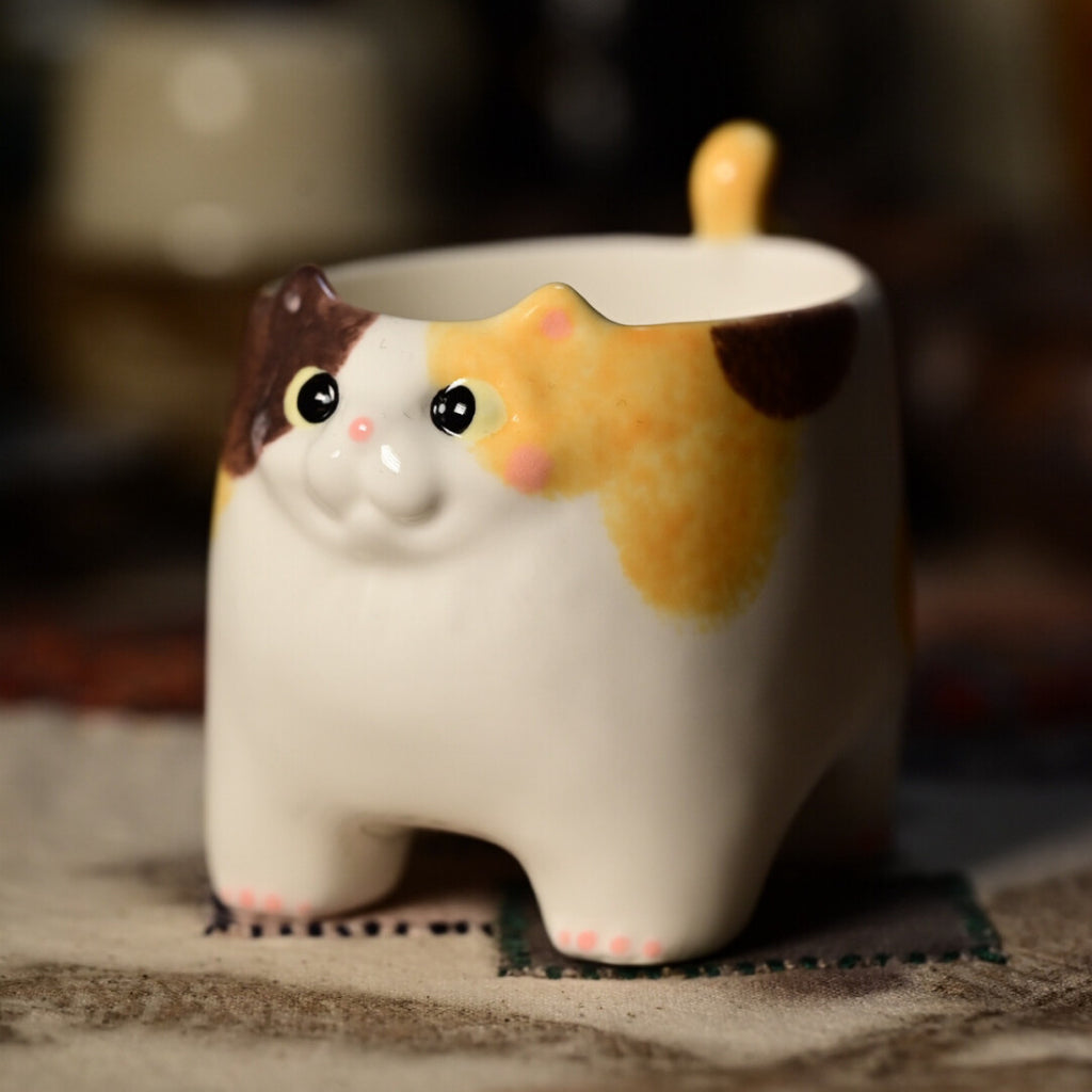 Tazza a forma di coda di gatto